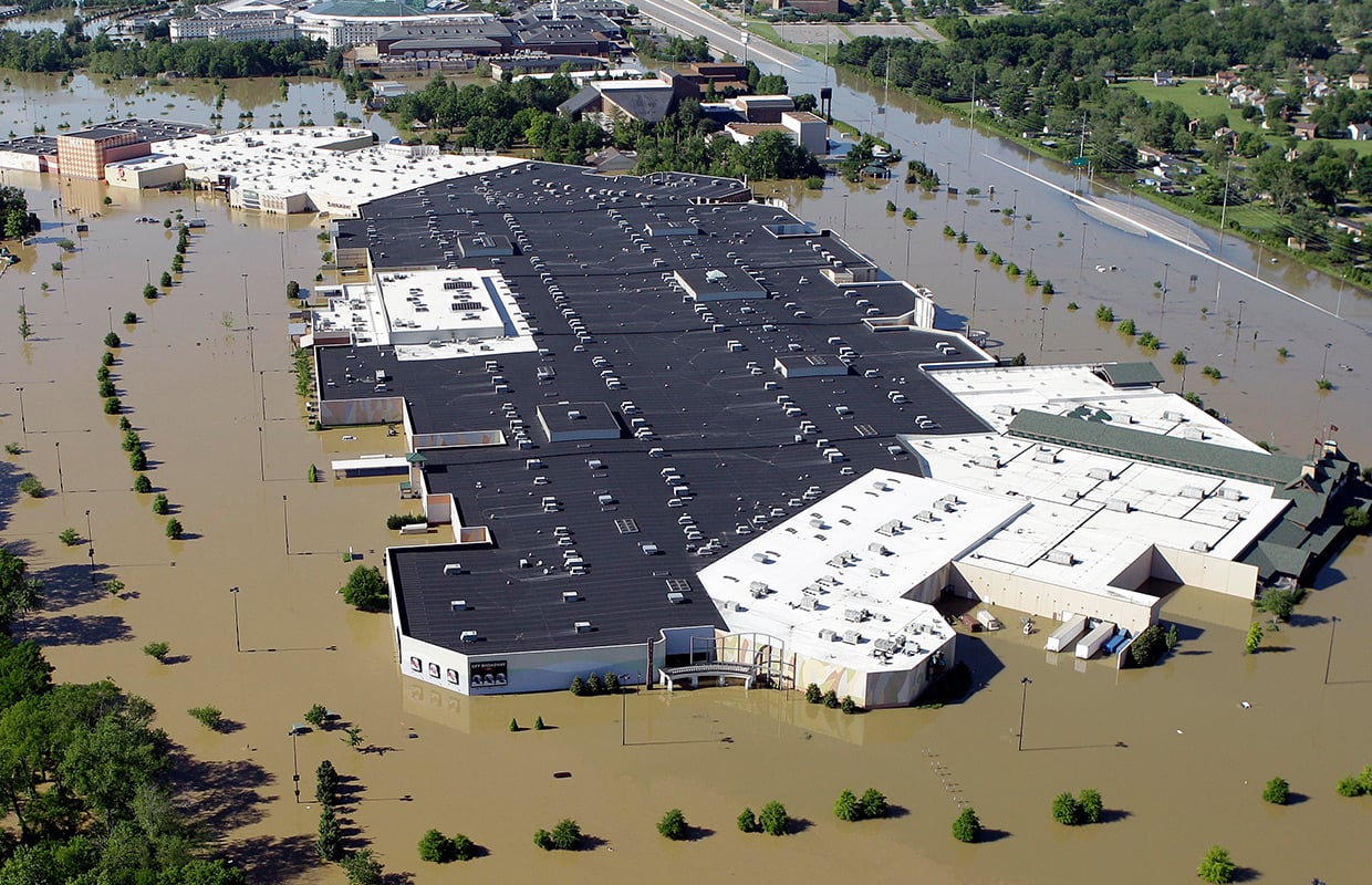 a building surrounded by a flood
