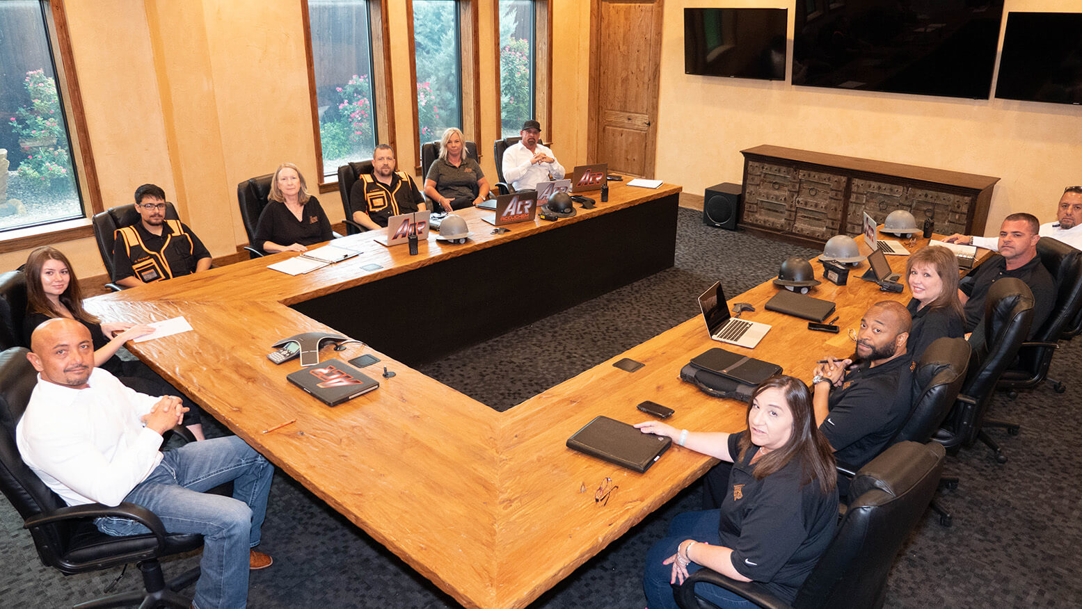 ACR Companies team gathered in conference room